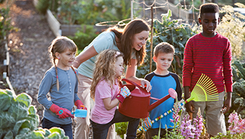 Volunteers helping in the garden