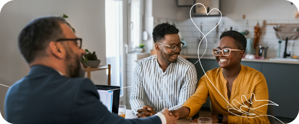Happy couple getting guidance on financial support from Foresters financial