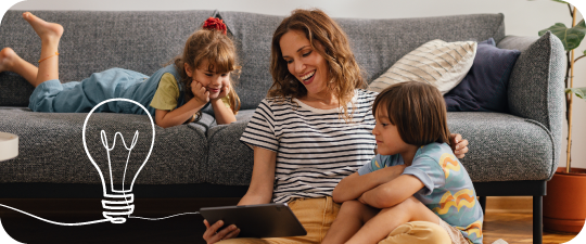 mother with children on the ipad learning about saving for her children with Foresters