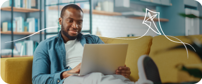 Man on laptop exploring Foresters ISAs with fund choice to suit him